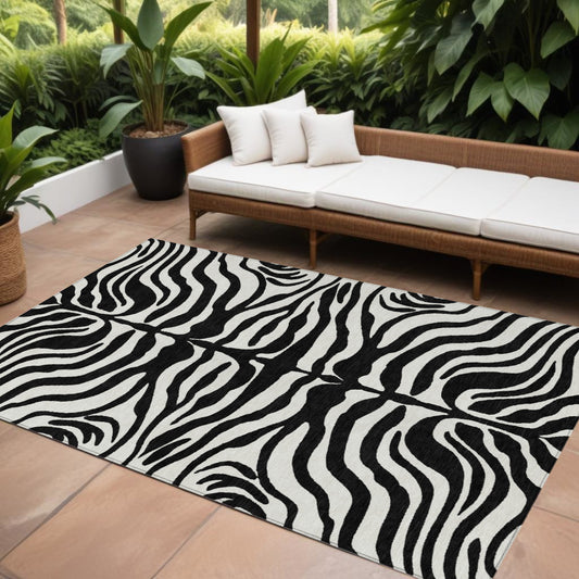 9' X 12' Black And Ivory Animal Print Washable Indoor Outdoor Area Rug-0